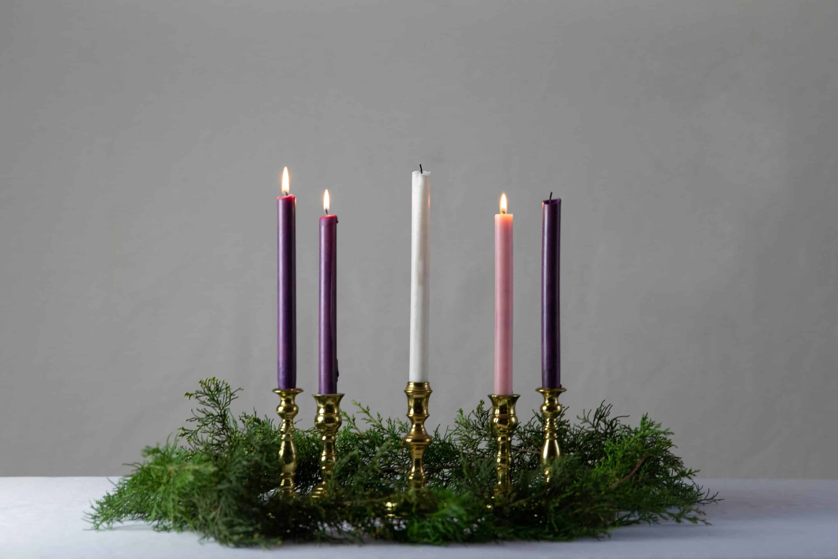 Advent wreath with 3 candles lit.